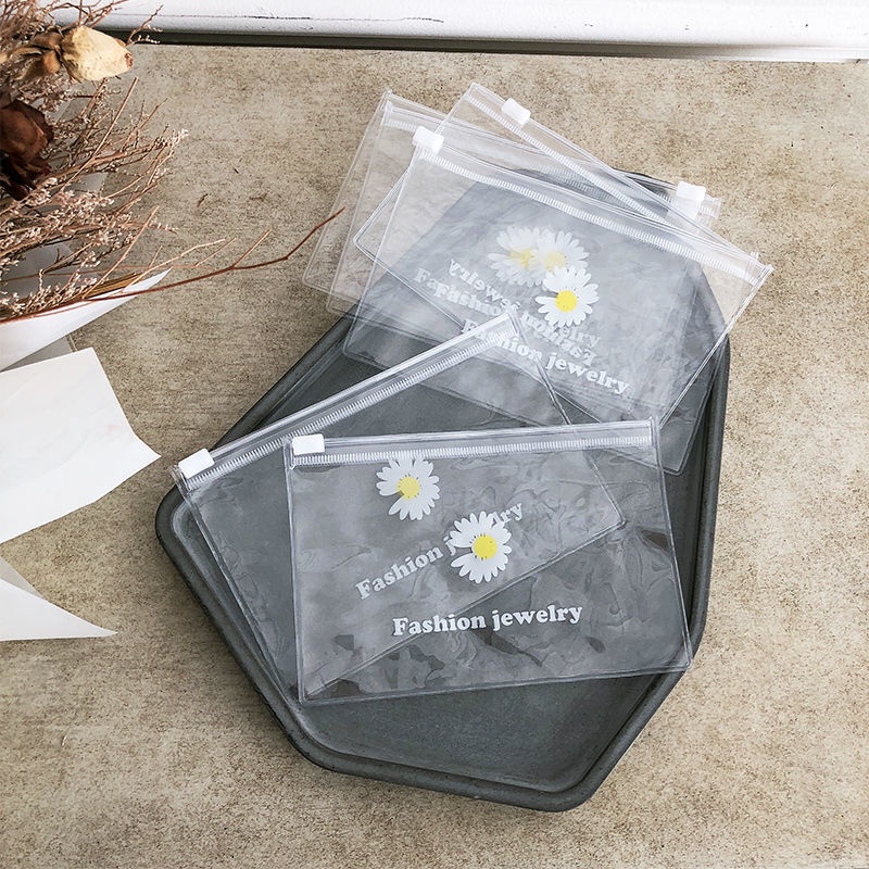 Túi Đựng Bút Bằng Pvc Trong Suốt Họa Tiết Hoa Cúc 17 * 12cm Có Khóa Kéo Tiện Dụng Mang Theo Du Lịch