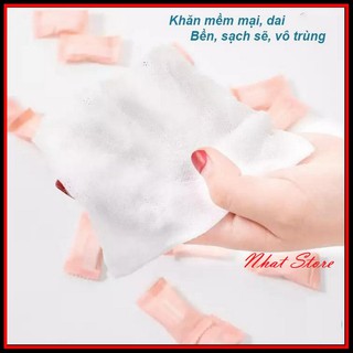 Khăn giấy nén dạng viên kẹo màu hồng dễ dàng bỏ túi đi du lịch, đi làm