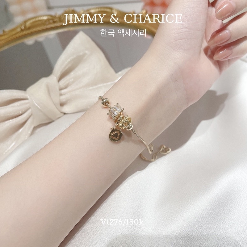 Lắc tay charm Jimmy & Charice dây rút 2 màu | BigBuy360 - bigbuy360.vn