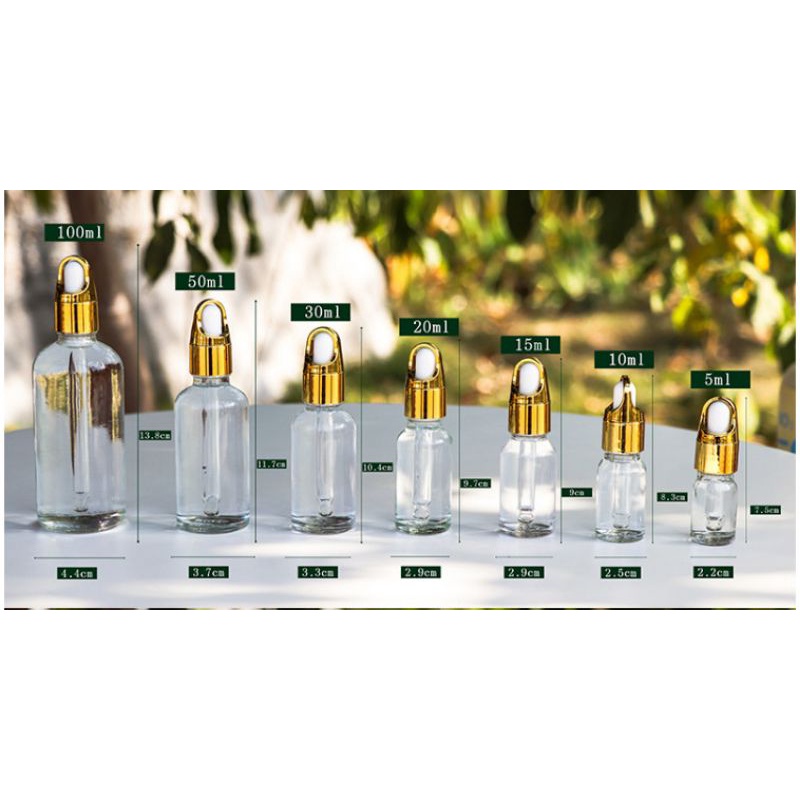 Vỏ chai mỹ phẩm thủy tinh serum trắng trong khoen quai xách vàng ống thủy tinh 5ml,10ml,15ml,20ml,30ml,50ml,100ml