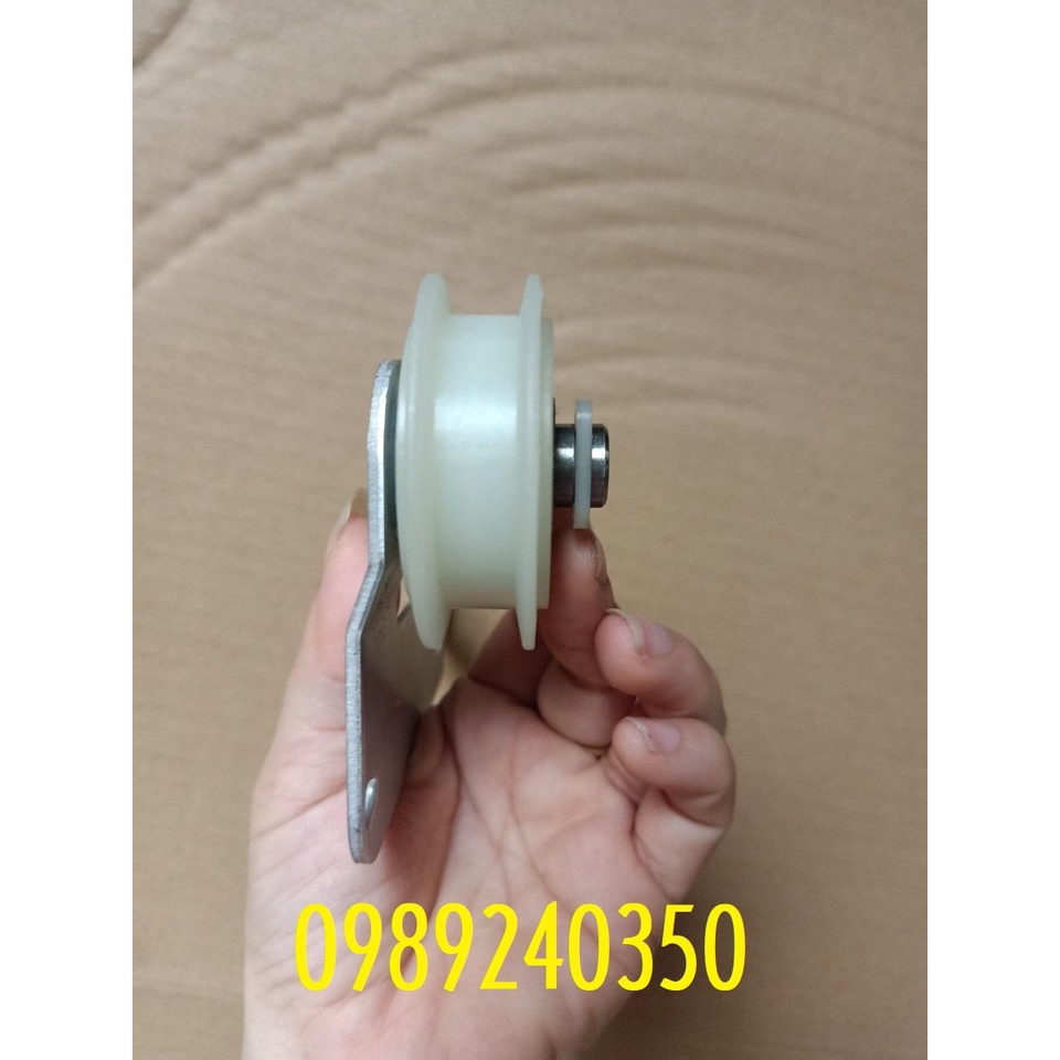 Bánh tỳ căng dây curoa máy sấy Whirlpool