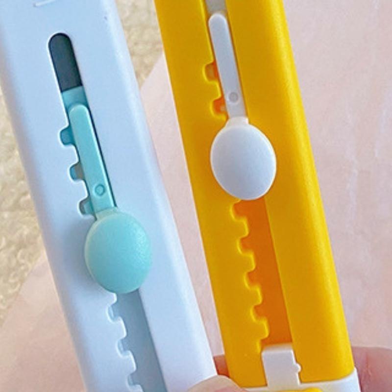 Dao rọc giấy mini gắn hình ngộ nghĩnh, dao đa năng dễ dàng sử dụng bỏ túi cho học sinh và văn phòng.