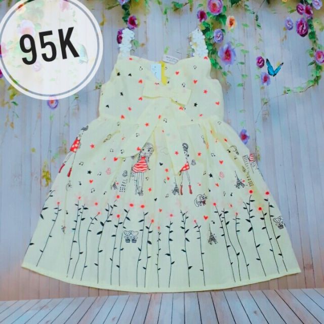 Váy hai dây đính nơ màu vàng giá chỉ còn 95k