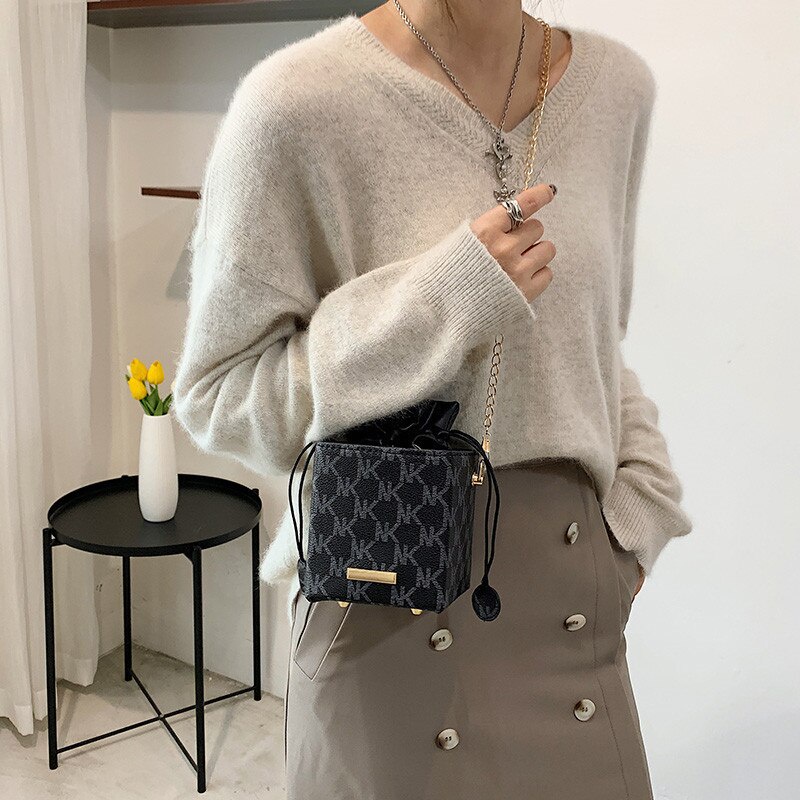 Túi đeo vai JASMIN NOIR in hoa văn thời trang thiết kế dây rút phong cách retro cho nữ