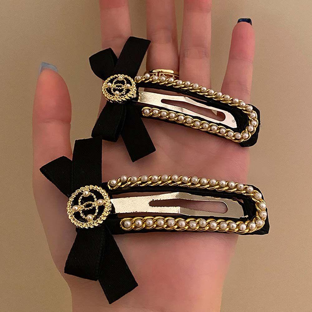 Kẹp Tóc Nơ Đen Kiểu Hình Học Thanh Lịch WMES15H Cho Nữ