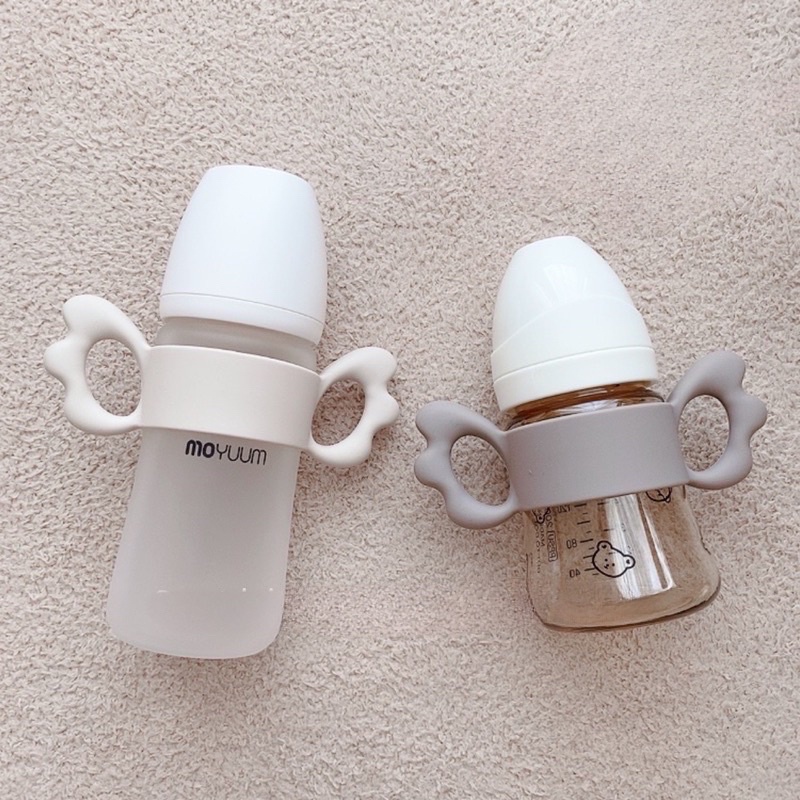 Tay Cầm Bình Sữa Cánh Tiên