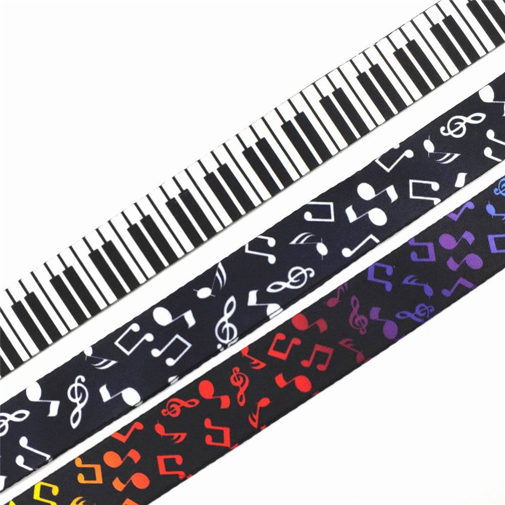 Móc chìa khóa kèm dây đeo in hình đàn piano độc đáo