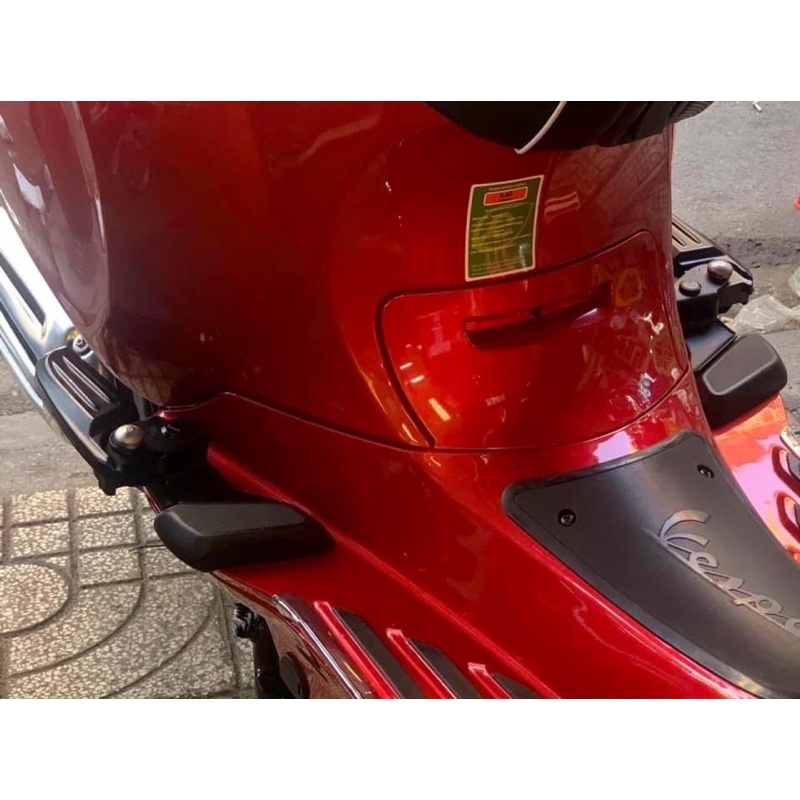 Bộ gác chân bấm sau Vespa ( 2 bên )