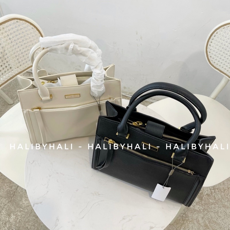 Túi cnk ngăn kéo trước có quai xách