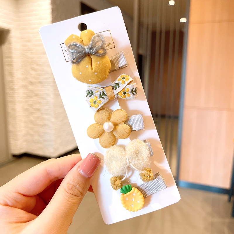 Set 5 Kẹp tóc hình hoa nơ dễ thuơng cho bé gái.