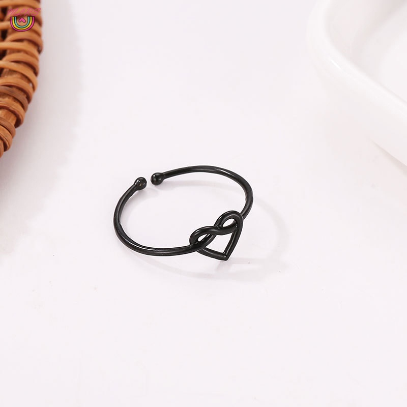 Nhẫn hợp kim hình trái tim xoắn rỗng có thể điều chỉnh thời trang cho nữ