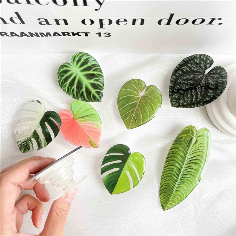Giá Đỡ Điện Thoại Hình Chiếc Lá Mini Đơn Giản Chống Trượt Thông Dụng