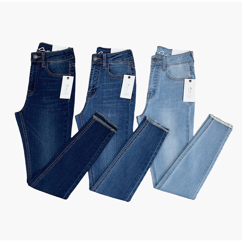 Quần skinny lai tua