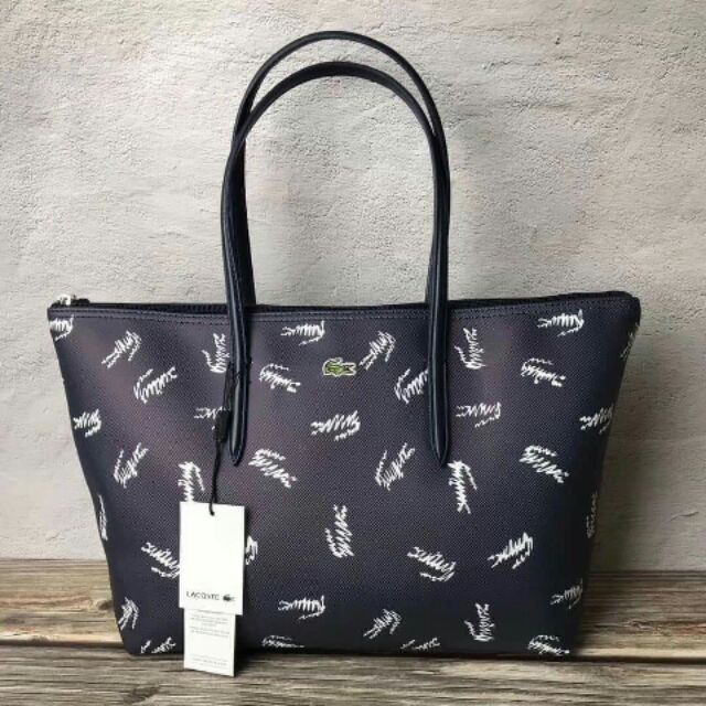 Túi Lacoste TQ xuất dư tiện dụng