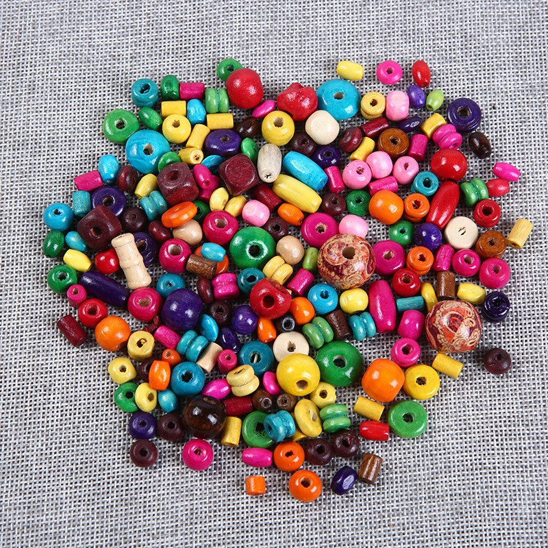 Túi 50g hạt gỗ trộn mẫu dùng xâu vòng (tầm 200 viên), làm đồ mầm non