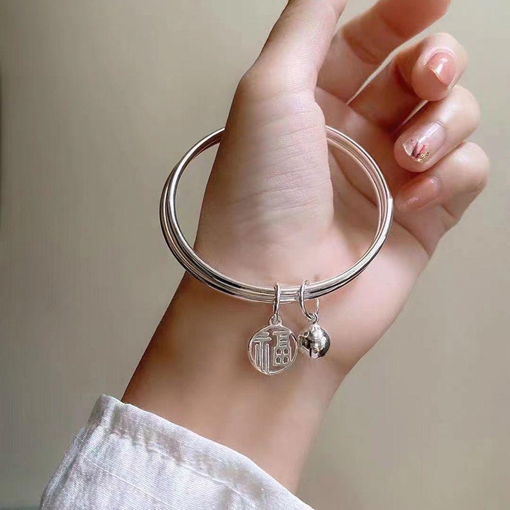 Vòng Tay Hai Lớp Gắn Chuông May Mắn Dễ Thương Cho Cặp Đôi