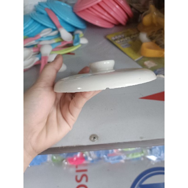 Nắp sứ bộ nồi nấu cháo chậm bear 0,8l bị mẻ,lỗi một ít