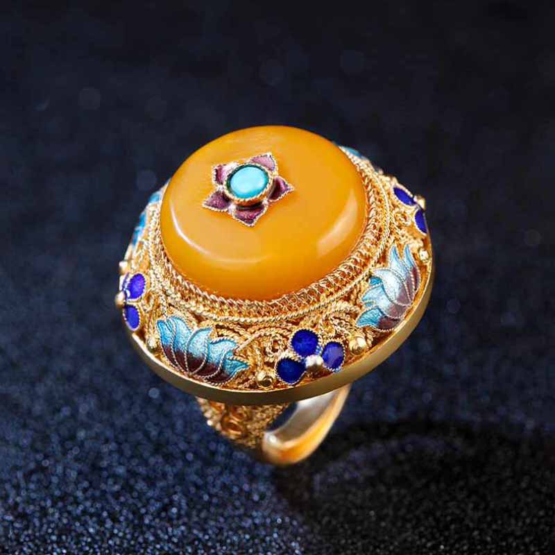 Nhẫn Sứ Hình Hoa Sen Đính Đá Topaz Sang Trọng