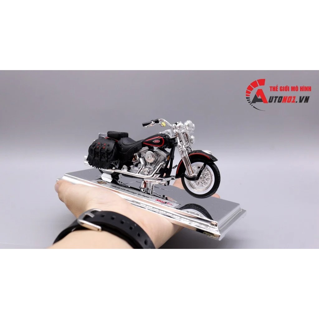 MÔ HÌNH HARLEY DAVIDSON 1998 FLSTS HERITAGE SPRINGER 1:18 MAISTO 3614