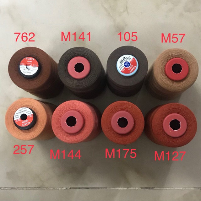 Chỉ may ống lớn 5000m tông nâu, cam đất