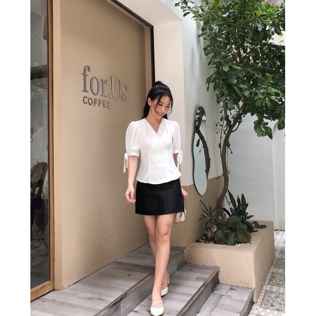 Áo trắng peplum cổ V xinh tưoi
