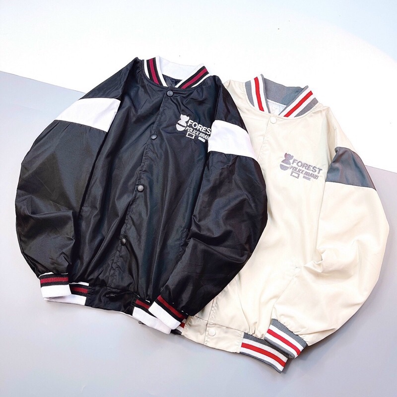 Áo khoác dù 2 lớp nút bấm thêu gốc