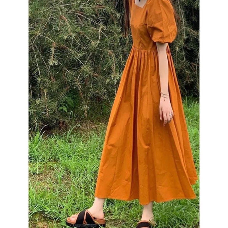 Váy nâu cam tiểu thư