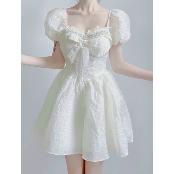 Đầm xốp VIỀN NGỌC NƠ NGỰC NUDE TAY PHỒNG