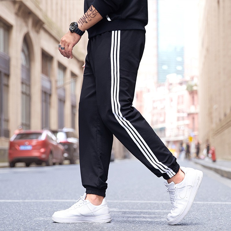 Quần thể thao jogger nam nữ unisex chất liệu nỉ Xneo loại 1 dày 3 sọc năng động - quần jogger 3 line bo ống