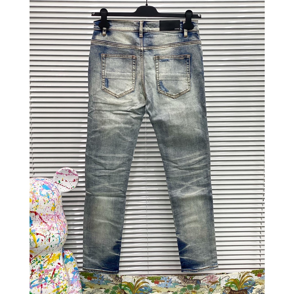 Quần Jean Amiri rách vá wash đỏ LA on web