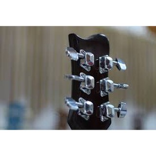Khoá hộp đàn guitar