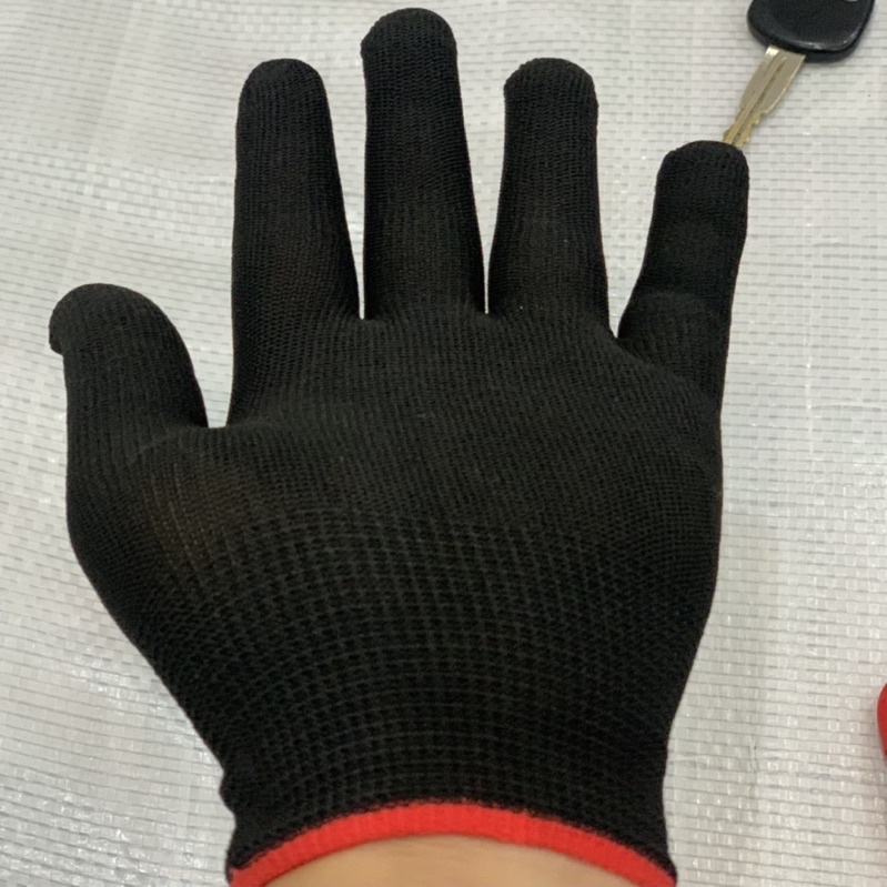 1 lố găng tay mút màu đen và màu ghi