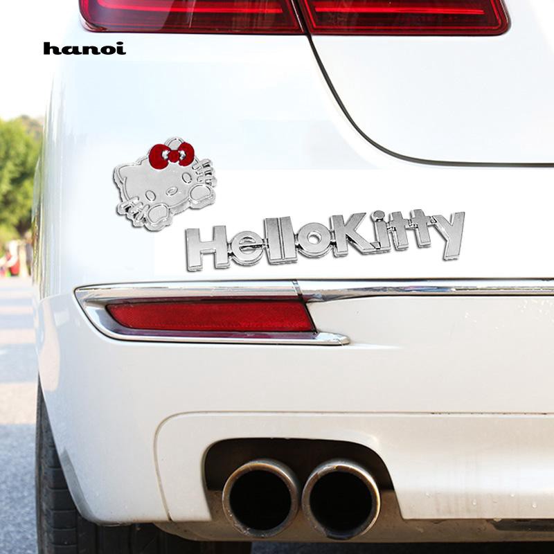 Set 2 decal kim loại hình mèo Hello Kitty dán xe hơi dễ thương