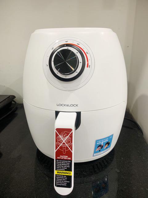 An aerial view of a field. A road runs through the upper right corner.