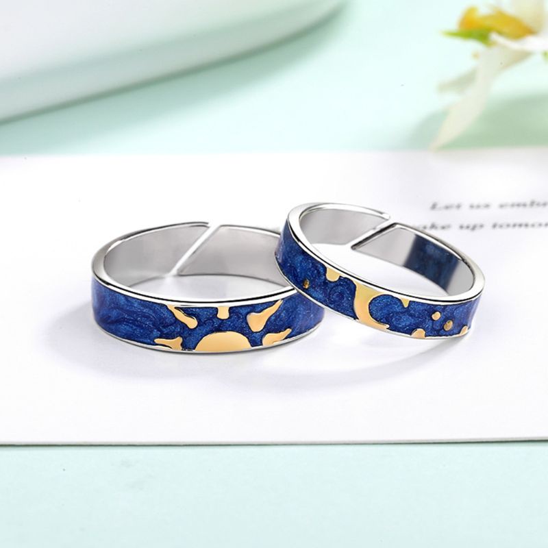 Bộ 2 Nhẫn Đeo Tay Bằng Hợp Kim Tráng Men Họa Tiết Bầu Trời Đầy Sao Màu Sắc Xanh Dương Độc Đáo Không Phai Màu Cho Nam