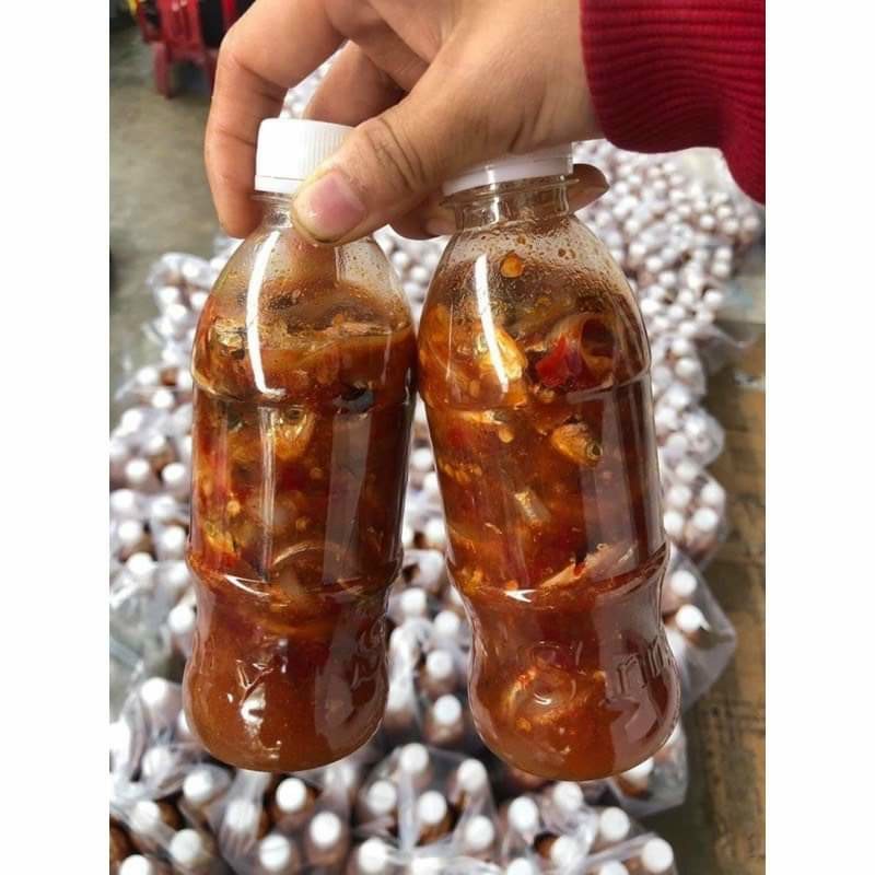 Mắm cá cơm nguyên con 1 chai gần 400gr y hình