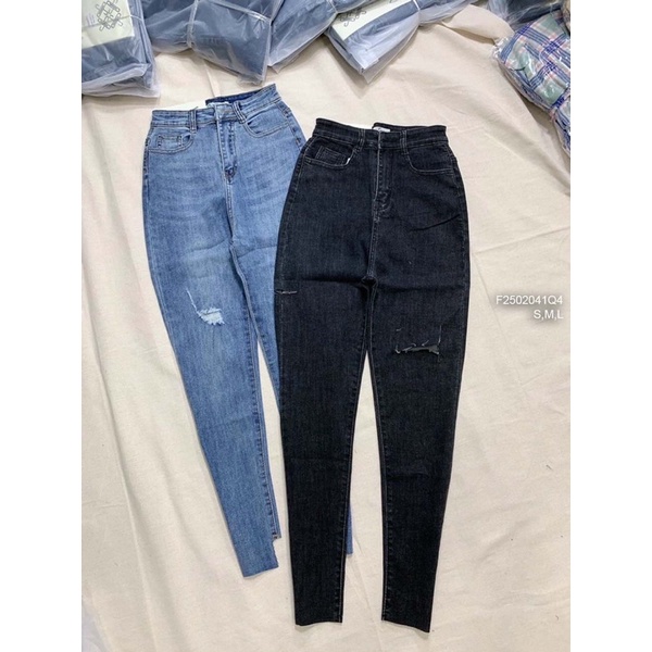 Quần jeans rách lai