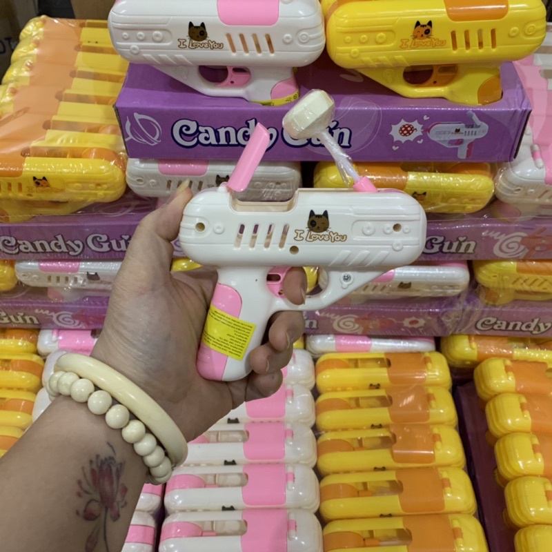 Súng Bắn Kẹo Mút