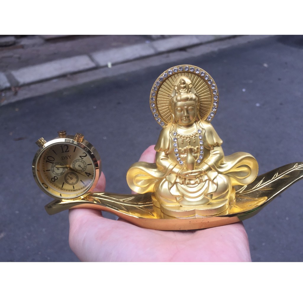 Tượng phật bà kèm đồng hồ trang trí taplo xe hơi .