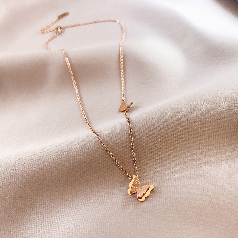 Dây chuyền bằng thép titan 18K màu vàng hồng mặt hình bướm ba chiều