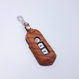 Bao da bọc smartkey SH Mode màu nâu đỏ, được làm thủ công từ da bò thật nhập khẩu, nhận khắc tên và hình ảnh miễn phí