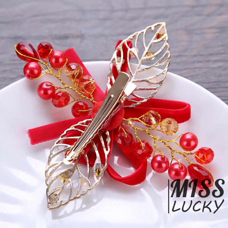 Kẹp tóc đính lá và ngọc giả xinh xắn dành cho nữ