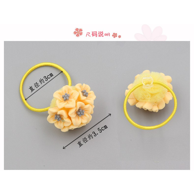 Dây chun cột tóc đính hoa dễ thương cho bé gái