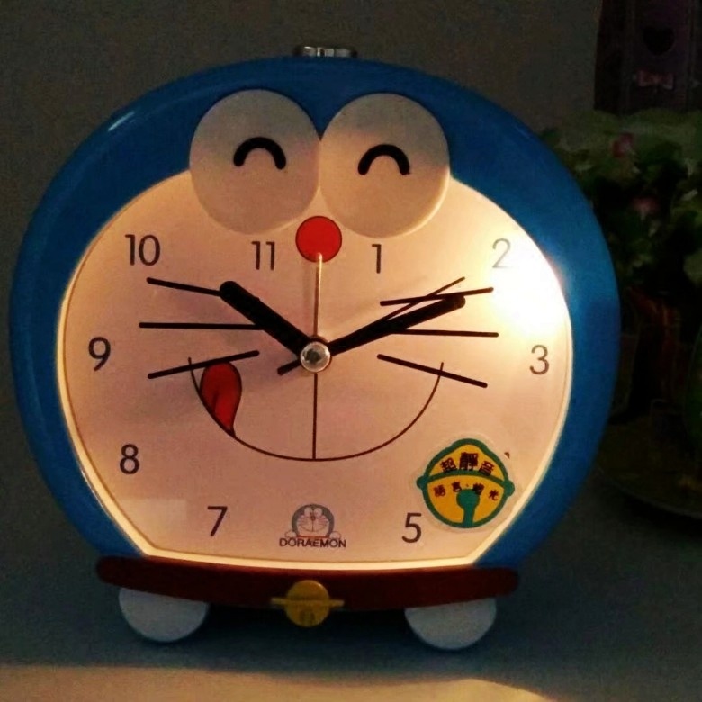 Đồng Hồ Báo Thức Hình Mèo Doraemon Dễ Thương Có Đèn Ngủ Và Nhạc Vui Nhộn Dành Cho Bé