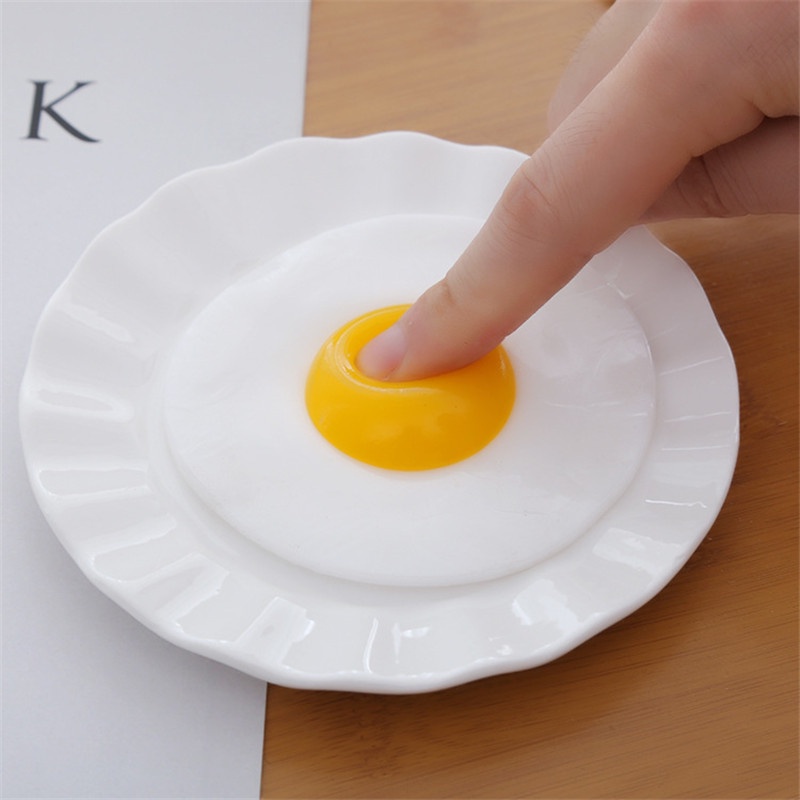 Đồ chơi bóp tay hình con gà đẻ trứng vui nhộn