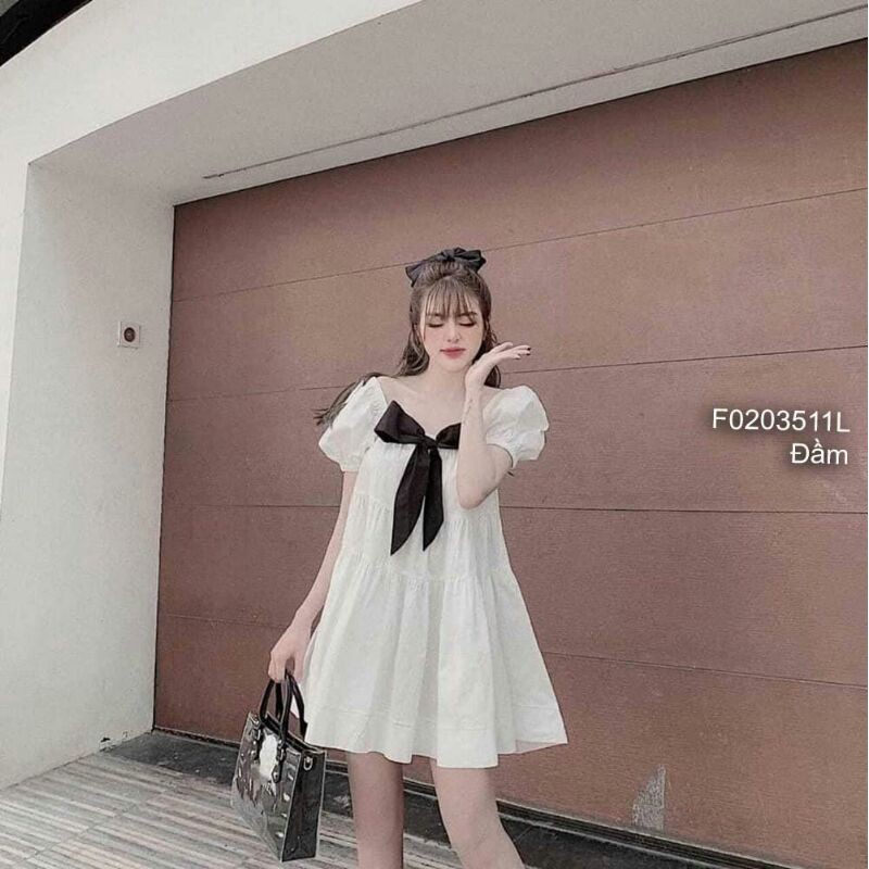 Đầm babydoll trắng phối nơ ngực tay phồng!