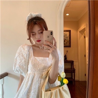 Đầm babydoll gấm xốp hở lưng cột nơ siêu xinh