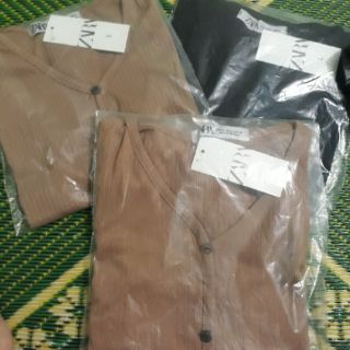 Áo len tăm cổ tim