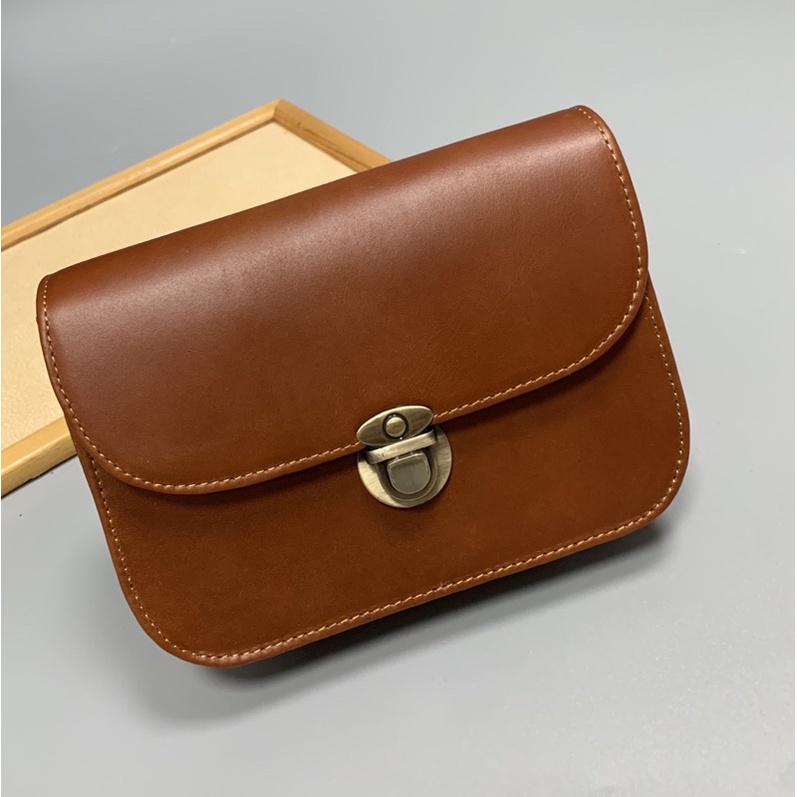 Túi đeo chéo da bò