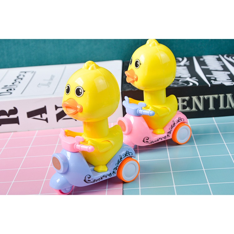 Đồ chơi dạng kéo họa tiết vịt con chạy xe moto dành cho trẻ em